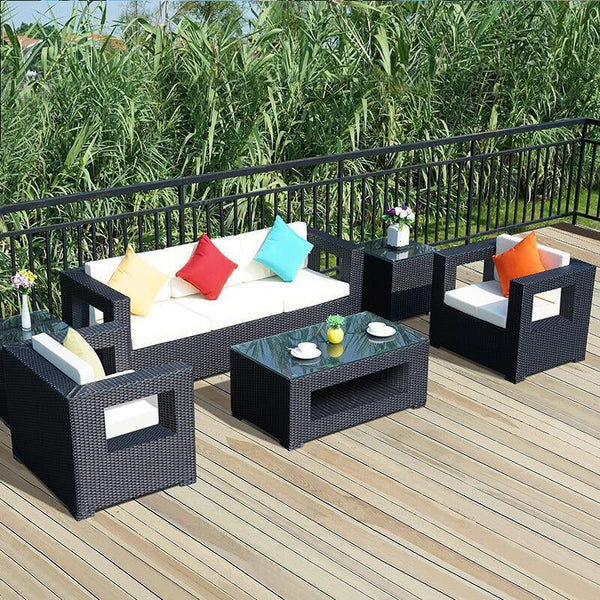 Outdoor set - sofa, two chairs, and a table