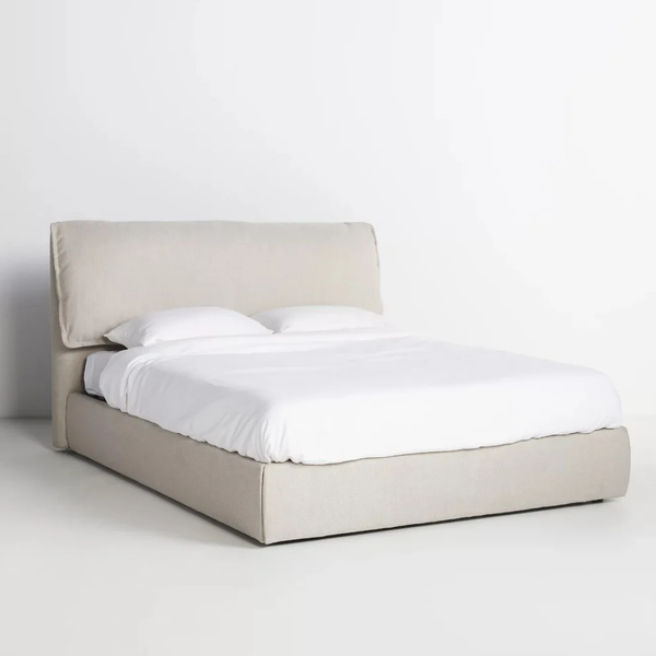 Wooden bed with beige velvet fabric