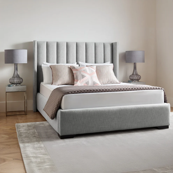 Wooden bed with gray velvet fabric